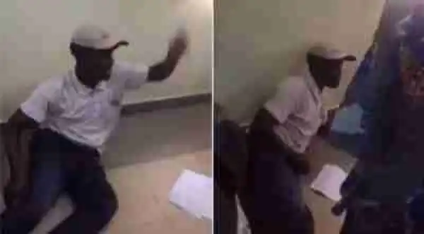 Drama as Aggrieved Man Sleeps on the Floor of a Bank Over N5000 in Abuja (Photos)